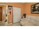 Relaxing bedroom featuring a large closet, couch, and views to other areas of the home at 1375 Gran Vista Ave, Henderson, NV 89012