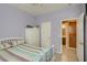 Charming bedroom with a bed, closet, and views to other areas of the home at 1375 Gran Vista Ave, Henderson, NV 89012
