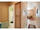 Inviting hallway that showcases access to different rooms within the home and neutral color palette at 1375 Gran Vista Ave, Henderson, NV 89012