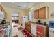Functional kitchen with lots of cabinet space, granite countertops, and white appliances at 1375 Gran Vista Ave, Henderson, NV 89012