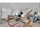 Open-concept dining area showcasing a decorated table, with views to the living room at 1909 Pinsky Ln, North Las Vegas, NV 89032
