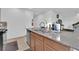 Bright kitchen with granite countertops and stainless steel appliances at 1909 Pinsky Ln, North Las Vegas, NV 89032