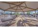 Park pavilion with picnic tables offers a shaded gathering spot for outdoor community events and relaxation at 1909 Pinsky Ln, North Las Vegas, NV 89032