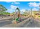 Community playground featuring modern play structures and recreational space perfect for outdoor activities at 1909 Pinsky Ln, North Las Vegas, NV 89032