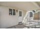 Inviting back porch features a white door, window, and modern lighting fixture at 1945 Margarita Ave, Henderson, NV 89011