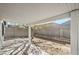 The backyard boasts a covered patio, concrete slab, and block wall for enhanced privacy at 1945 Margarita Ave, Henderson, NV 89011