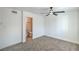 This bedroom features carpet, a ceiling fan, with an ensuite bathroom adding convenience and privacy at 1945 Margarita Ave, Henderson, NV 89011
