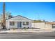 Charming home featuring a well-manicured yard and driveway at 1945 Margarita Ave, Henderson, NV 89011