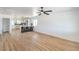 Spacious living room featuring an open floor plan with stylish bar seating and wood flooring at 1945 Margarita Ave, Henderson, NV 89011