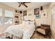 Inviting bedroom filled with pictures, shelving, and tiled floors at 2021 Evansdale St, Henderson, NV 89052
