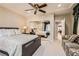 Bedroom offers access to the bath and closet plus a relaxing loveseat at 2021 Evansdale St, Henderson, NV 89052