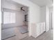 Bright bedroom features a ceiling fan, desk with shelves, and built in storage cabinets at 2124 Brighton Shore St, Las Vegas, NV 89128
