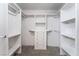 A closet with shelves and drawers, offering ample storage space for clothing and accessories at 2124 Brighton Shore St, Las Vegas, NV 89128
