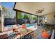 Cozy covered patio with a spa, swimming pool, and outdoor furniture for relaxing at 2132 Ponticino St, Henderson, NV 89044