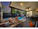 Backyard with outdoor seating area, hot tub, and sparkling swimming pool at 2132 Ponticino St, Henderson, NV 89044
