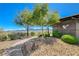 Inspirada community entrance with desert landscaping, a modern design, and scenic mountain views at 2132 Ponticino St, Henderson, NV 89044