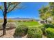 Well-maintained green space in the Inspirada community, with manicured shrubs and desert landscaping at 2132 Ponticino St, Henderson, NV 89044