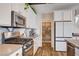 The kitchen features stainless steel appliances, a modern backsplash, and a convenient pantry at 2132 Ponticino St, Henderson, NV 89044