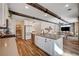 Open concept kitchen features stainless steel appliances, breakfast bar, and easy flow into living area at 2132 Ponticino St, Henderson, NV 89044