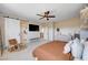 Cozy main bedroom with barn door to bath, TV, and views of the second floor at 2132 Ponticino St, Henderson, NV 89044