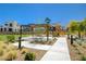 Community playground with modern equipment, picnic area, and landscaping in a residential neighborhood at 2132 Ponticino St, Henderson, NV 89044