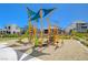 Neighborhood playground with slide, climbing ropes, and shade canopies for outdoor fun at 2132 Ponticino St, Henderson, NV 89044