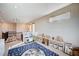 A playroom with toys, natural light, and a stairwell for fun and safety at 2132 Ponticino St, Henderson, NV 89044