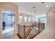 Light and bright upstairs hallway with laundry room at 2132 Ponticino St, Henderson, NV 89044