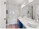 Elegant bathroom with dual vessel sinks, marble countertops, and a luxurious walk-in shower at 2325 Windmill Pkwy # 1711, Henderson, NV 89074