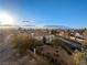 Stunning aerial view of condo featuring beautiful landscaping and surrounding community at 2325 Windmill Pkwy # 1711, Henderson, NV 89074
