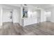 Open-concept layout showcasing a modern kitchen with a marble island and seamlessly connected living spaces at 2325 Windmill Pkwy # 1711, Henderson, NV 89074