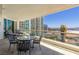 Balcony featuring cityscape views, outdoor seating, and sun loungers, perfect for relaxation at 2877 Paradise Rd # 2203, Las Vegas, NV 89109
