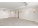 Spacious carpeted basement with decorative sconces and recessed lighting at 2877 Paradise Rd # 2203, Las Vegas, NV 89109