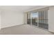 Bright bedroom featuring large sliding glass doors leading to a private balcony with city views at 2877 Paradise Rd # 2203, Las Vegas, NV 89109