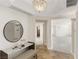 Inviting entryway featuring stylish console table, mirror, and elegant lighting fixture at 2877 Paradise Rd # 2203, Las Vegas, NV 89109