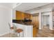 Modern kitchen with custom cabinets, countertops, and stainless steel appliances at 2877 Paradise Rd # 2203, Las Vegas, NV 89109
