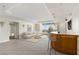 Bright living room with floor-to-ceiling windows, bar area, and city views at 2877 Paradise Rd # 2203, Las Vegas, NV 89109