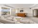 Spacious living area with comfortable seating, wet bar, and stunning city views at 2877 Paradise Rd # 2203, Las Vegas, NV 89109