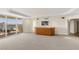 Open living area with a bar, access to balcony, and expansive city views at 2877 Paradise Rd # 2203, Las Vegas, NV 89109
