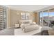 Bright bedroom with balcony access, neutral decor, and city views, perfect for relaxation at 2877 Paradise Rd # 2203, Las Vegas, NV 89109
