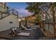 Multi-level backyard with lounging area, fireplace, and lush landscaping at 3069 Lascari Ave, Henderson, NV 89044