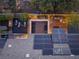 An aerial view of an amazing backyard with a rooftop deck, solar panels, and an outdoor lounge area at 3069 Lascari Ave, Henderson, NV 89044