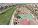 Community basketball courts with green and red surfaces and well-maintained landscaping at 3069 Lascari Ave, Henderson, NV 89044