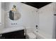 Modern bathroom with subway tile, sleek fixtures, and a shower-tub combination for a relaxing experience at 3069 Lascari Ave, Henderson, NV 89044