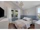 Serene bedroom with soft colors, natural light, and hardwood floors for a calming retreat at 3069 Lascari Ave, Henderson, NV 89044