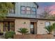 Charming two-story home with stone accents and professionally landscaped front yard at 3069 Lascari Ave, Henderson, NV 89044