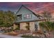 Charming two-story home with stone accents and professionally landscaped front yard at 3069 Lascari Ave, Henderson, NV 89044