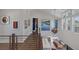 Bright two-story foyer with modern chandelier and views of the kitchen and living area at 3069 Lascari Ave, Henderson, NV 89044
