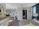 Open concept living area showcasing the decor, a bedroom, a kitchen, and a hallway with a bathroom at 3069 Lascari Ave, Henderson, NV 89044
