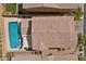 Aerial view of the property featuring the pool and tile roof at 3428 Royal Calloway Ave, Las Vegas, NV 89141